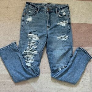 medium wash ripped stretch mom jeans from American eagle